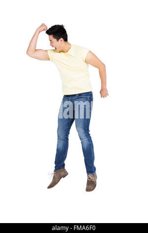 Happy man jumping in excitement Stock Photo