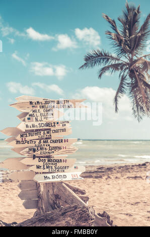 Funny direction signpost with names of newlyweds Stock Photo