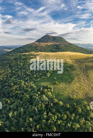 France, Puy de Dome, Orcines, Chaine des Puys, Regional Natural Park of the Auvergne Volcanoes, the Puy de Dome volcano (aerial Stock Photo