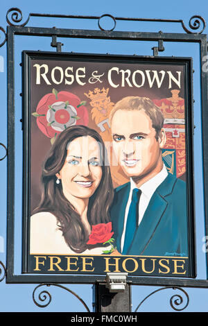 Kate and William painting on pub sign at Rose and Crown,Tilshead,Wiltshire,Salisbury Plain,England,U.K.,Europe. Stock Photo