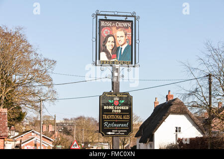 Kate and William painting on pub sign at Rose and Crown,Tilshead,Wiltshire,Salisbury Plain,England,U.K.,Europe. Stock Photo