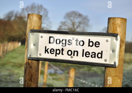 Dogs to be kept on a lead sign Stock Photo
