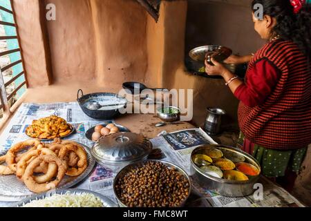 Nepal, Gandaki zone, Gorkha, a woman cooking Stock Photo