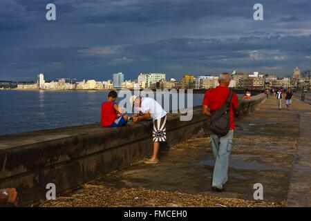 Cuba, Havana, listed as World Heritage by UNESCO, Activity on the edge of the Malecon Stock Photo