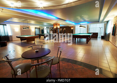 Billiard room and cafe in modern hotel Stock Photo