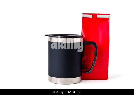 Black insulated cup with stainless steel interior and rotating lid with drinking spout near a red paper bag isolated on white. Stock Photo