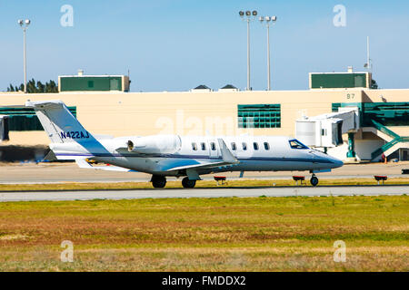 Learjet 45 taxiing at Sarasota SRQ airport in Florida Stock Photo
