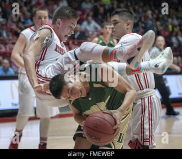 Usa. 11th Mar, 2016. Robertson's Sebastian Gonzales, top, fouls West Las Vegas' Isaiah Gallegos during their 4A semifinal game at the Pit Firday, March 11, 2016. West Las Vegas won 64 to 55. © Eddie Moore/Albuquerque Journal/ZUMA Wire/Alamy Live News Stock Photo