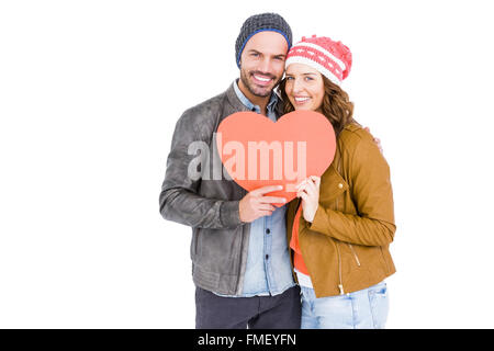 Young couple holding big heart Stock Photo