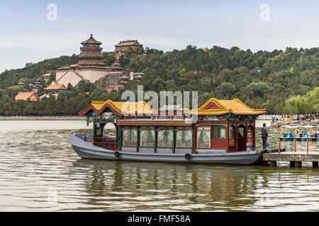 Old traditional ferry boat in the lake at Summer Palace in Beijing, China. Stock Photo