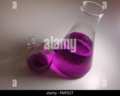 The laboratory glassware, solution of potassium permanganate Stock Photo