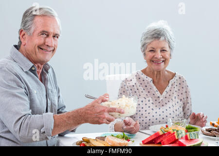 Elderly couple having breakfast Stock Photo
