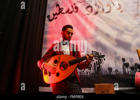Gaza, Palestine. 10th Mar, 2016. Palestinian members of the Dawaween music band, plays traditional oriental songs during a musical heritage concert in Gaza City. The Dawaween music band, founded 4 months ago by three musicians, counts now more than 40 members. © Mohammed Al Hajjar/RoverImages/Pacific Press/Alamy Live News Stock Photo