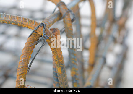 technician bundle wire steel rod for construction job Stock Photo