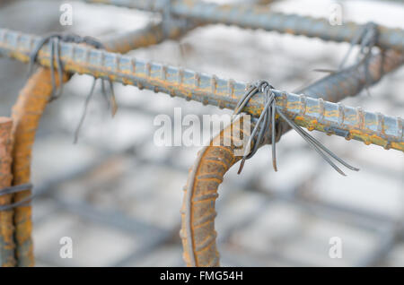 technician bundle wire steel rod for construction job Stock Photo