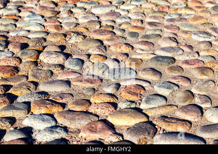 Old paved roadway as background close up Stock Photo