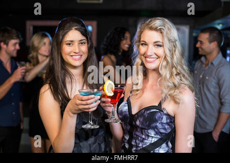 Portrait of friends having a drink Stock Photo