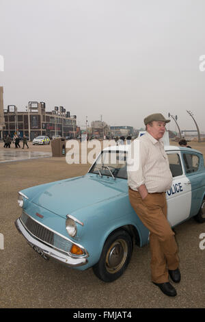 Blackpool,UK, 12th March 2016. Entertainment news. Actor David Lonsdale who plays the 'village fool' David Stockwell in the long running police series 'Heartbeat' promotes the new theatre tour based on the progamme at Blackpool's comedy carpet today. Posing for photograph's with the original police car from the show David speaks to members of the public to highlight this new theatre tour which starts at Blackpool's Grand Theatre on Wednesday the 16th of March. 2016. The nationwide tour finishes at Wolverhampton in July of this year Credit: Gary Telford/Alamy live news Stock Photo