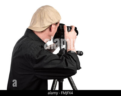 Photographer looking through camera isolated on white with clipping path Stock Photo