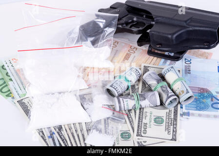 photo of the drugs, cocaine , money and gun Stock Photo