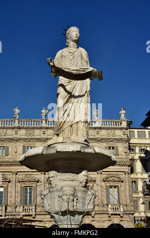 Ancient Fountain of Madonna Verona, in the center of Piazza delle Erbe square Stock Photo