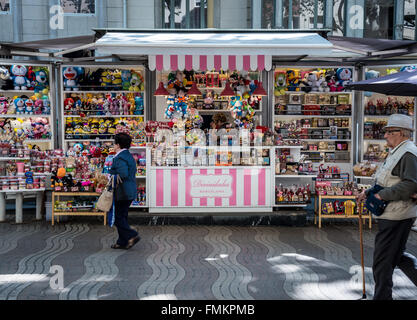 Souvenirs kiosk at La Rambla street in Barcelona, Spain Stock Photo