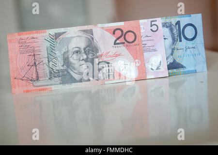 Hamburg, Germany. 19th Feb, 2016. ILLUSTRATION - Bank notes of the Australian Dollar lying on a table in Hamburg, Germany, 19 February 2016. Photo: Bodo Marks/dpa/Alamy Live News Stock Photo