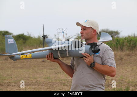 An Air Shepherd pilot prepares a drone for take-off in the Hluhluwe-Imfolozi Park located in KwaZulu-Natal province, South Africa, 15 February 2016. Photo: STUART GRAHAM/dpa Stock Photo