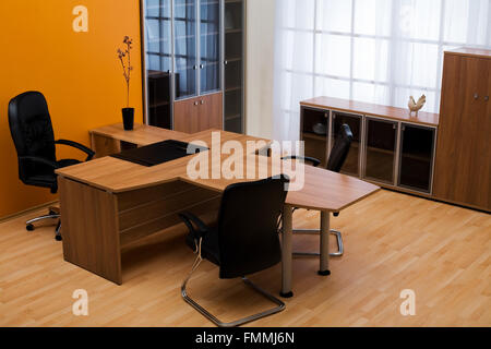 Armchair of director on a background of a wall Stock Photo