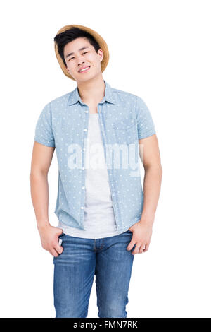 Young man standing with hands in pocket Stock Photo