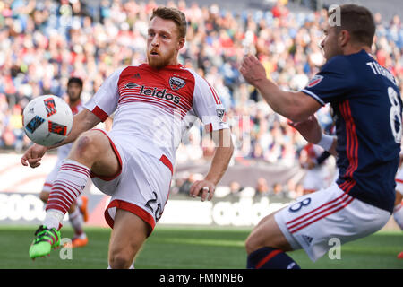 Foxborough, Massachusetts, USA. 12th March, 2016. D.C. United midfielder Rob Vincent (26) and New England Revolution defender Chris Tierney (8) in game action during the MLS game between DC United and the New England Revolution held at Gillette Stadium in Foxborough Massachusetts. Credit:  Cal Sport Media/Alamy Live News Stock Photo