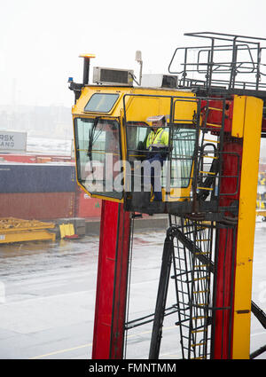Straddle container carrier on a rainy day in Port of Melbourne Australia Stock Photo