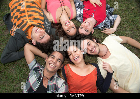 Group of young college students having fun outdoors Stock Photo