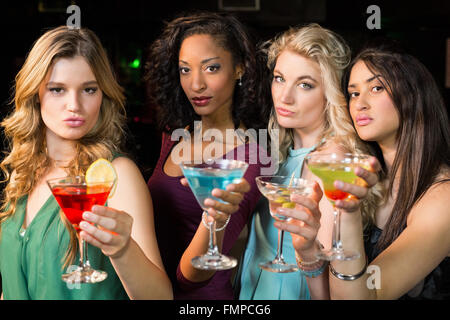Portrait of friends having a drink Stock Photo