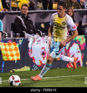 Columbus, Ohio, USA. 12th March, 2016. Columbus Crew midfielder Ethan Finlay (13) handles the ball in the match against Philedadelphia at Mapfre Stadium. Columbus, Ohio, USA. Credit:  Brent Clark/Alamy Live News Stock Photo