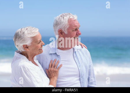 Senior couple smiling and looking away Stock Photo