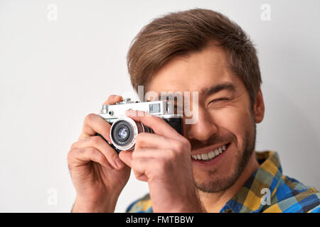 He knows how to make a good shot. Stock Photo