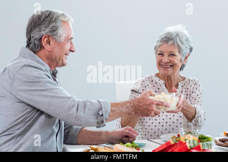 Elderly couple having breakfast Stock Photo