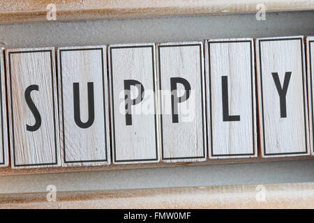 Supply word written on wood Stock Photo