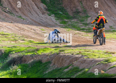 racer on a motorcycle in the desert summer day Stock Photo