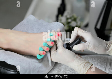 Just painted nails on the legs Stock Photo
