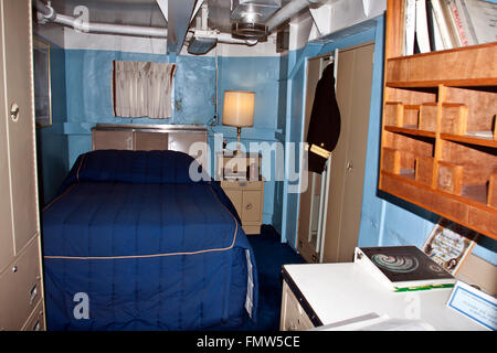 The battleship New Jersey, build in 1942 and stricken in 1999. This image shows the quarters, bedroom, of an officer. Stock Photo