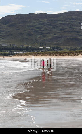 People on the beach at Stocker Strand (Ballymastocker Beach), Port Salon, County Donegal, Ireland Stock Photo