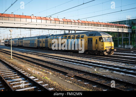 A passenger train. The main railway station of Maastricht. Railway transport of the Netherlands. Stock Photo