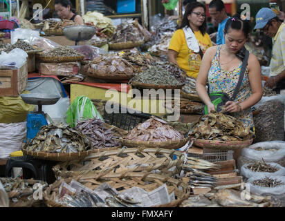 Dried fish is a particular delicacy in the Philippines. The image shows a vendors stall in Taboan Market,Cebu City. Stock Photo