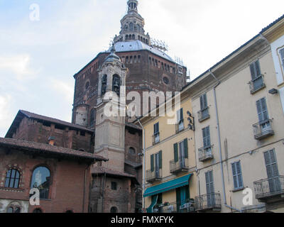 The Cathedral of Pavia, belfry and apartment building. Stock Photo
