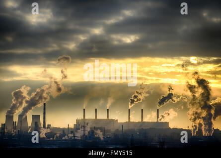 Industrial landscape. From pipe factory smoke, polluting the atmosphere. HDR image Stock Photo