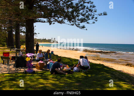 Picnickers at Moffatt Beach at Caloundra on the Sunshine Coast in Queensland, Australia. Stock Photo