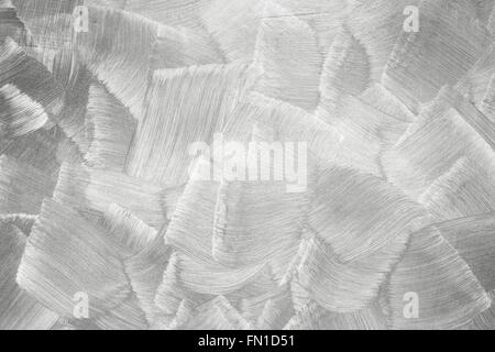 Closeup white concrete wall texture with decorative paint layer over plaster pattern Stock Photo
