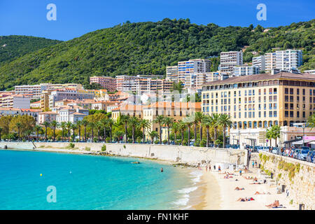 AJACCIO, FRANCE - OCTOBER 29, 2014: Beachgoers on in the Town of Ajaccio on the west coasat of the Corsica Island. Stock Photo